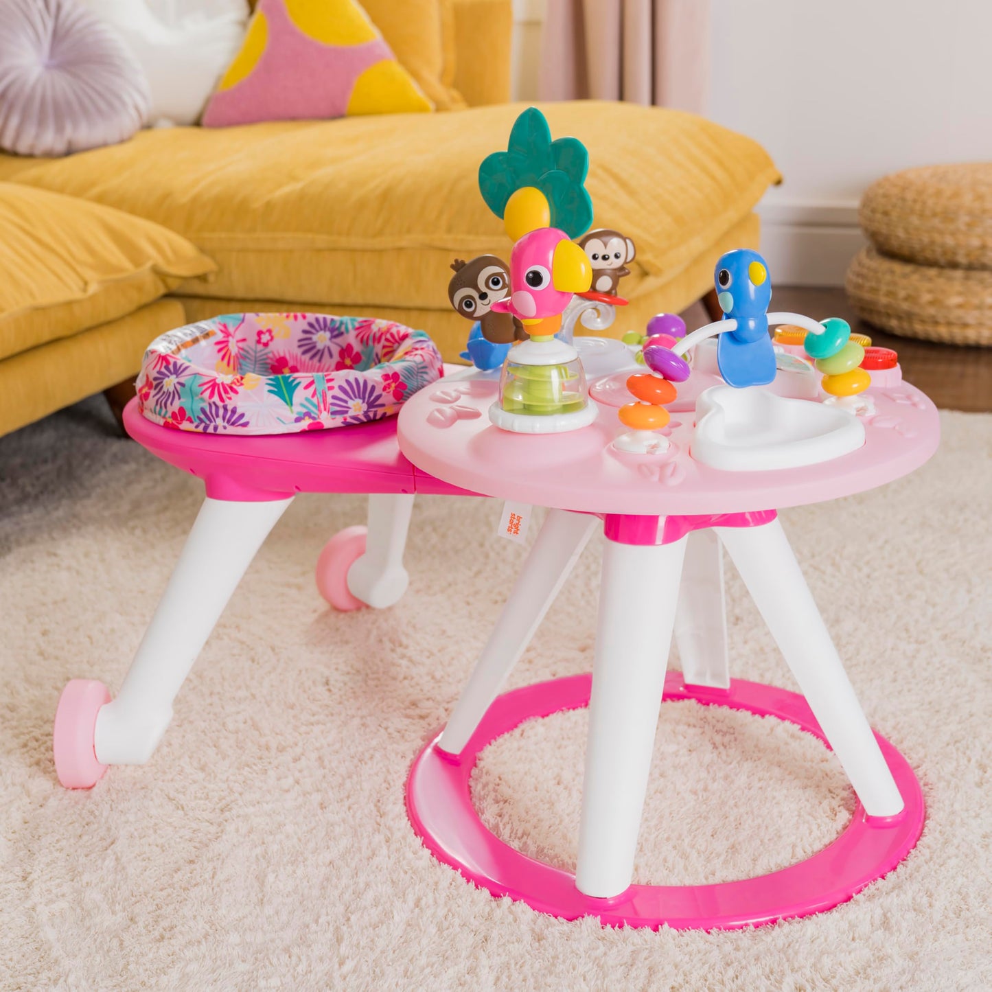 Bright Starts Around We Go Tropic Coral 2-in-1 play center and activity table, pink