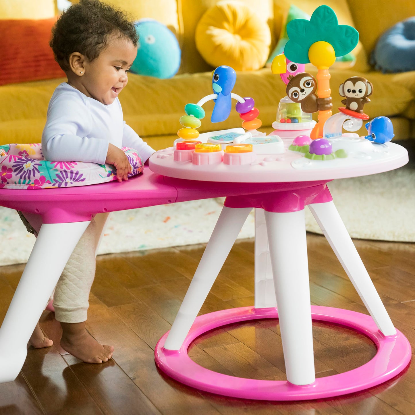 Bright Starts Around We Go Tropic Coral 2-in-1 play center and activity table, pink