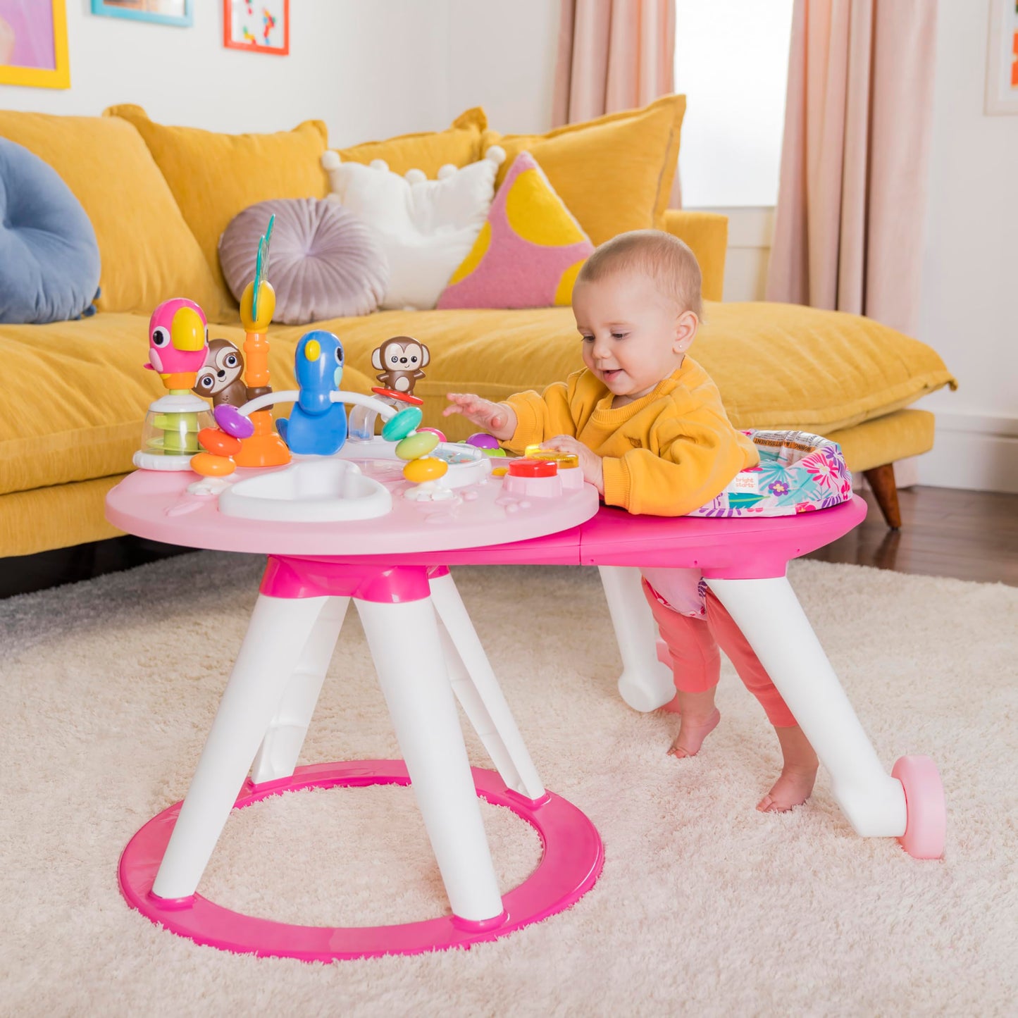 Bright Starts Around We Go Tropic Coral 2-in-1 play center and activity table, pink