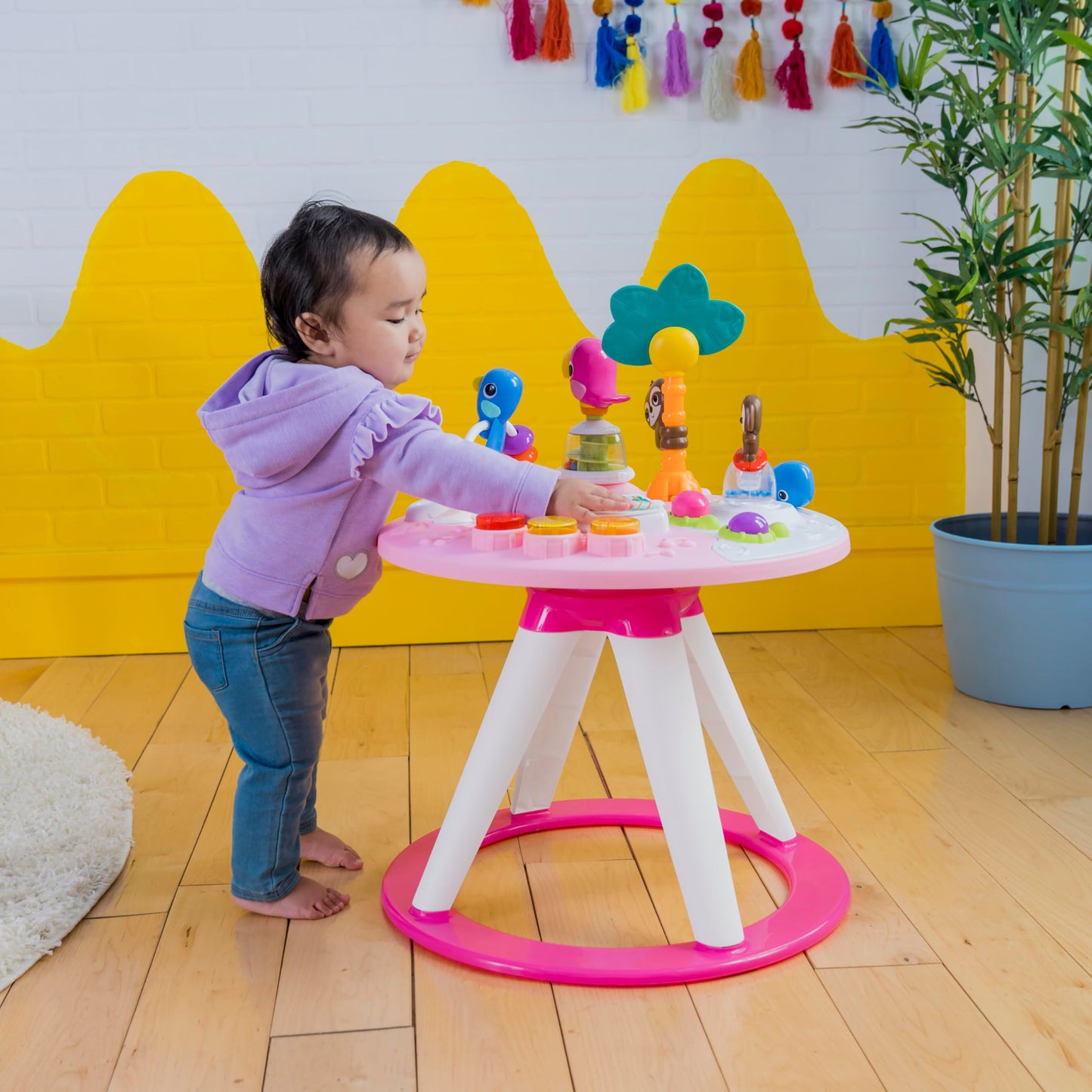 Bright Starts Around We Go Tropic Coral 2-in-1 play center and activity table, pink