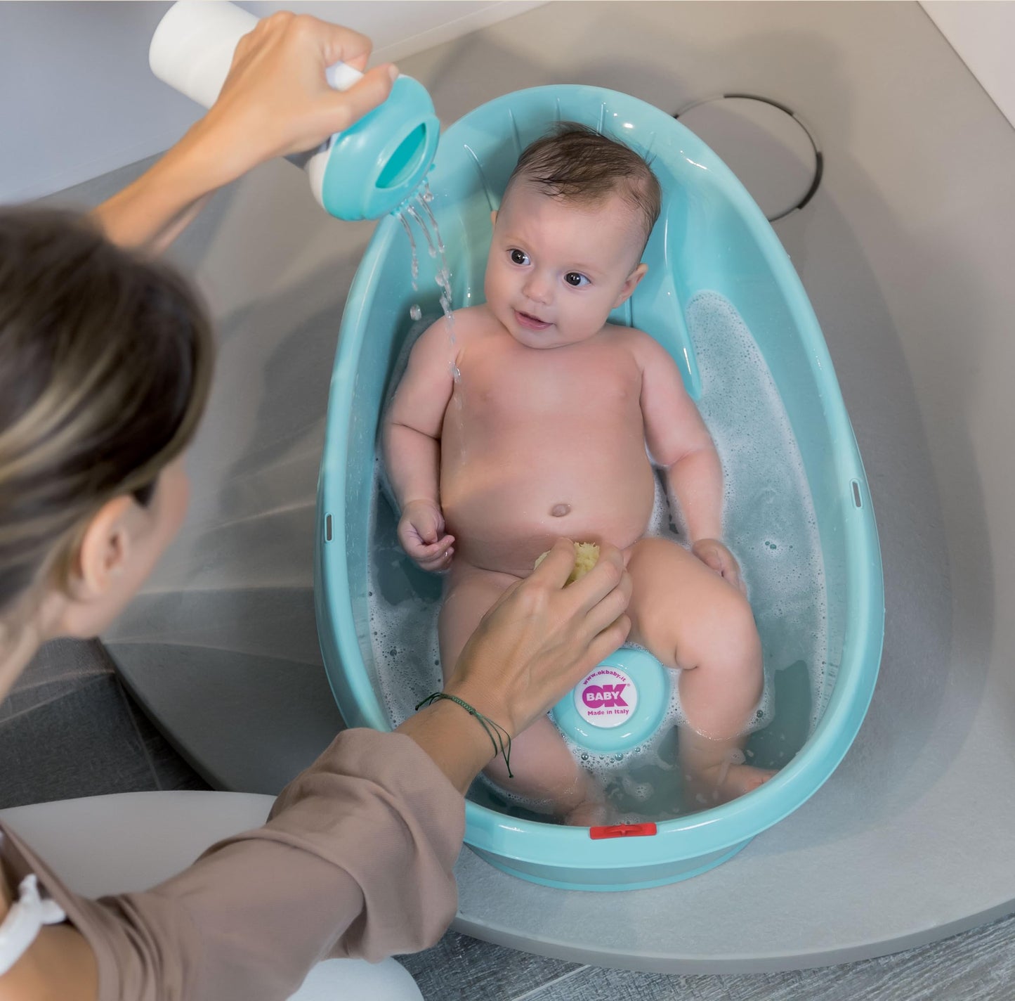 OKBaby Onda Compact dušivann beebile, türkiissinine