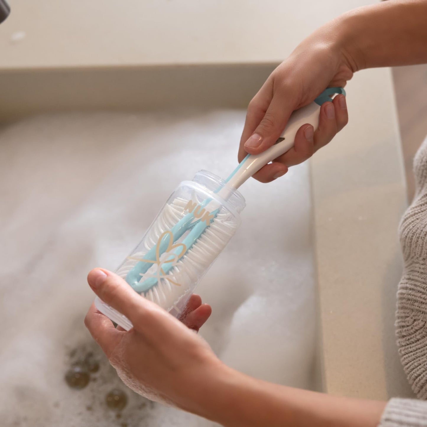 NUK Twist pudelihari käsnaga ja integreeritud pudeliluti harjaga, münt, 1 tk