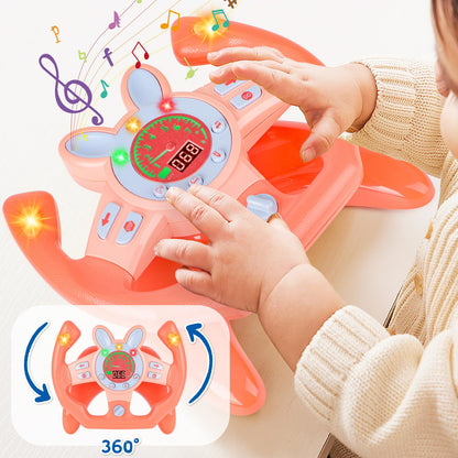 Interaktive children's driving simulator with sounds and lights, pink